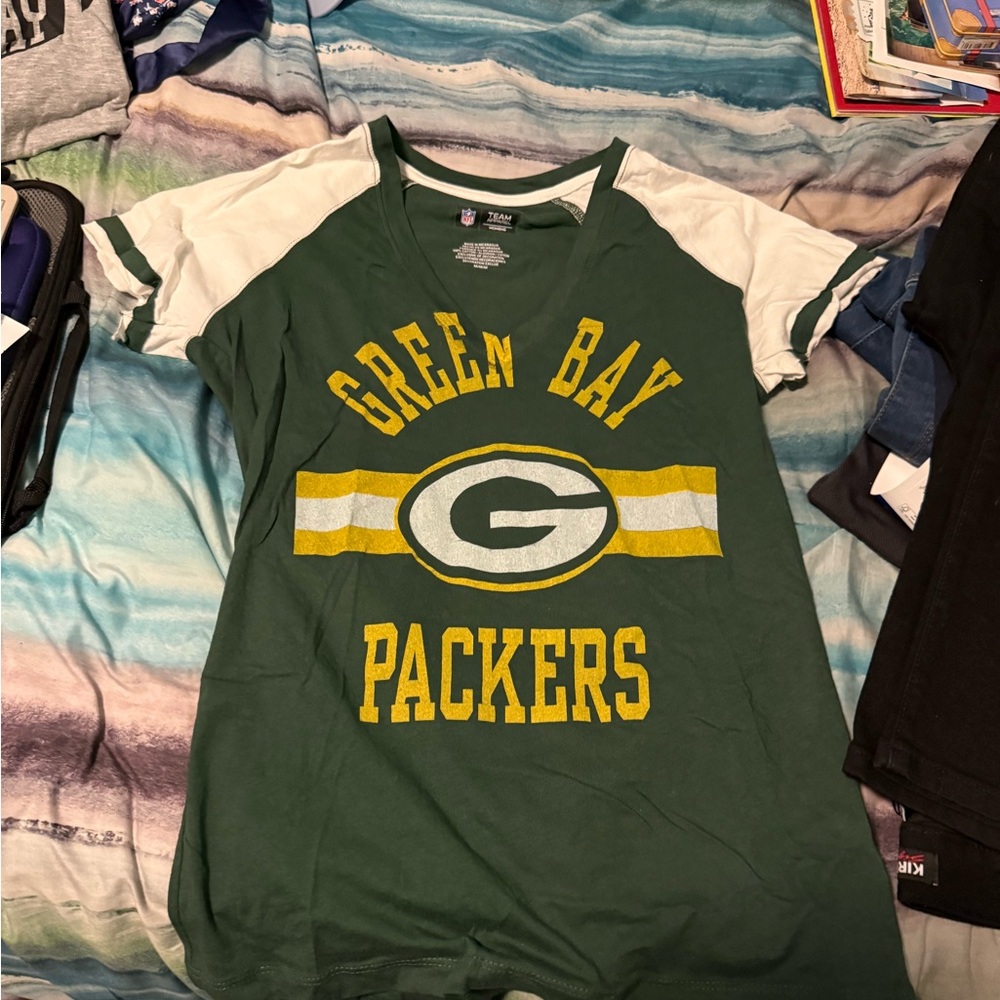 Green Bay Packers ladies Shirt brand new size medium but it’s small fitting